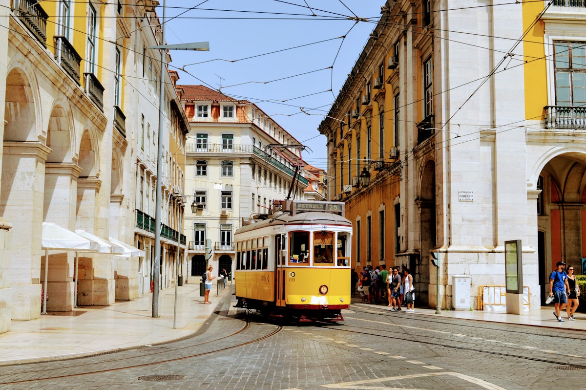 A historic tram on a hillside city street